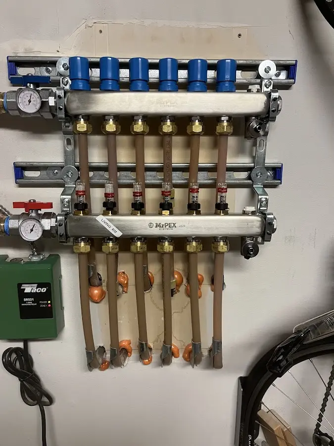 Plumber performing Water Heater Repair at a residential property in Poplar Bluff